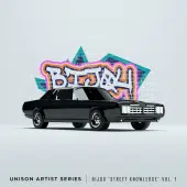 A black classic car is parked in front of a graffiti wall. The vibrant graffiti reads "Bijou" with colorful designs on a white brick background. Text at the bottom says "Unison Artist Series - BIJOU 'Street Knowledge'," featuring exclusive tracks from the Bijou sample pack.